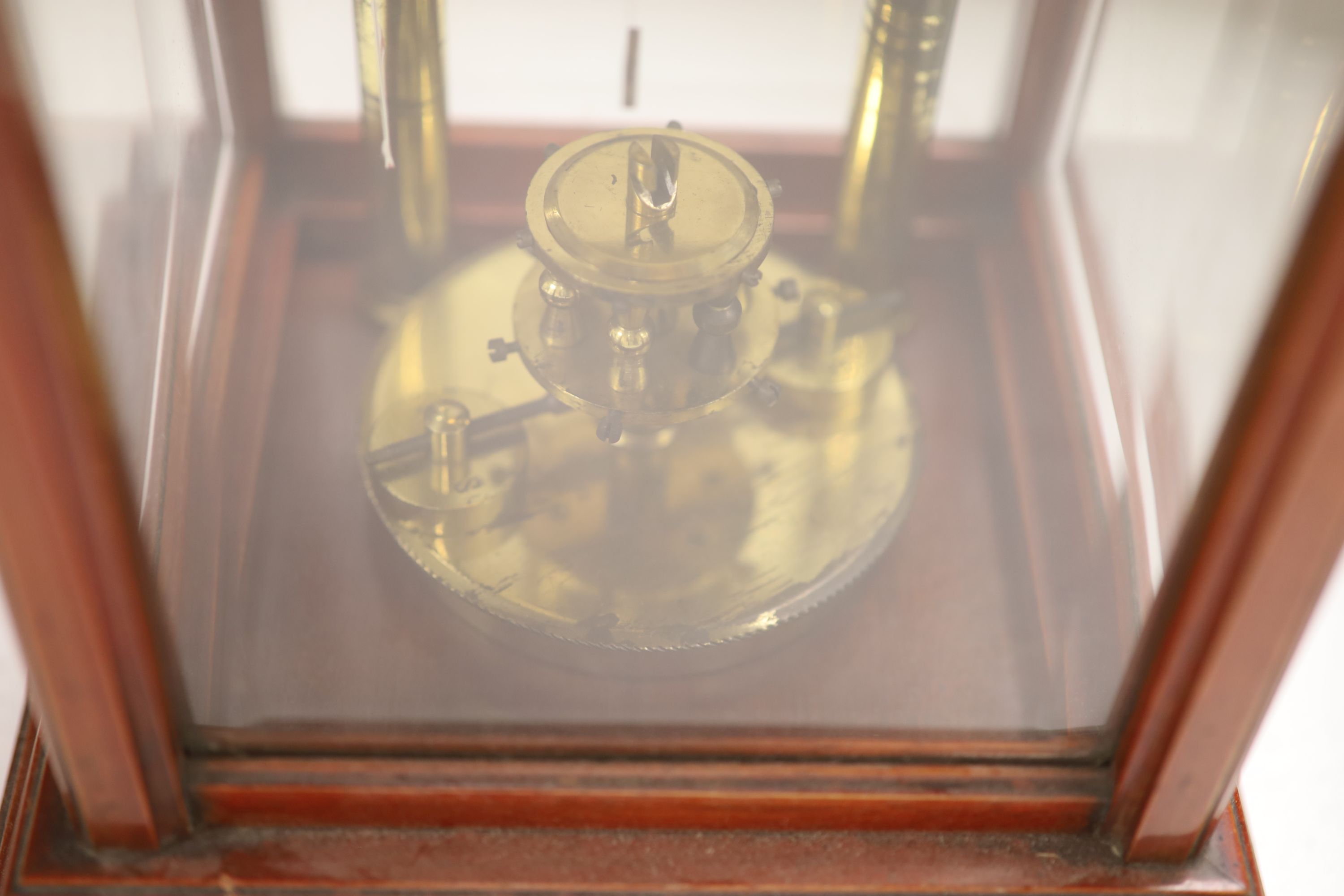 An early 20th century mahogany cased electric four glass mantel clock, height 31cm